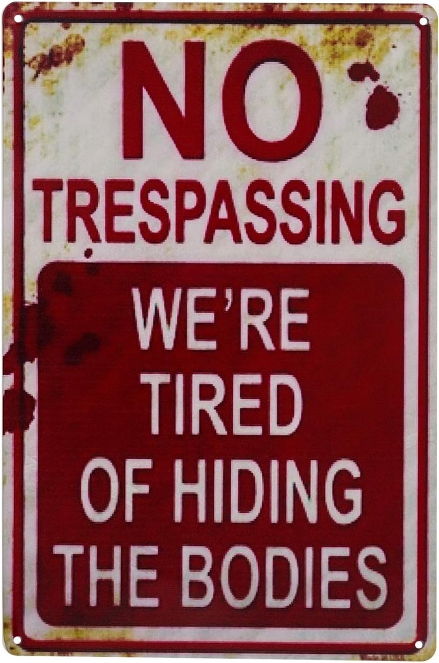 Metal Halloween tin sign: “No Trespassing—We're Tired of Hiding the Bodies.”